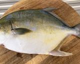 A picture of step 1 of Fried Shortfin Pompano with Crispy Garlics.