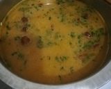 A picture of step 4 of Tumeric rice with sausages, egg curry and salad.