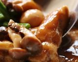 A picture of step 12 of Tender Stewed Chicken and Shimeji Mushrooms in a Sweet and Sour Sauce.
