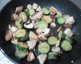 A picture of step 5 of Stir Fried Shiitake Mushrooms and Cucumber With Butter Soy Sauce.
