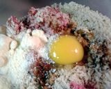 A picture of step 8 of macaroni meatballs and meat and cheese sauce.