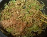 A picture of step 3 of Stir-Fried Pork Belly and Cabbage with Okonomiyaki Sauce.