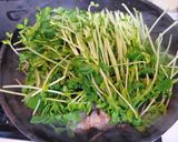 A picture of step 5 of Pork Bits and Pea Shoots Stir-Fried with Ginger and Pepper.