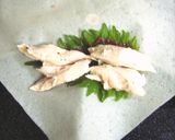 A picture of step 4 of Chicken Spring Rolls with Salt-Cured Plum and Shiso Leaf.