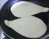 A picture of step 7 of Cheese Naan Bread.