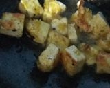A picture of step 2 of Naan with masala paneer.