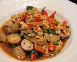 A picture of step 4 of Pad Gra Prao Pizza.