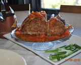 A picture of step 11 of Giant Spaghetti Stuffed Meatball.