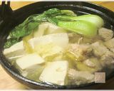 A picture of step 3 of Gingery Chicken and Tofu Hot Pot.