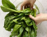 A picture of step 2 of Blanched spinach with sesame dressing.
