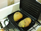 Pollo al curry con papas al natural tostadas