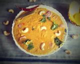 A picture of step 8 of Shahi kaju and mango curry.