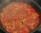 Foto del paso 3 de la receta: Huevo poché con tomate y picadillo de pollo