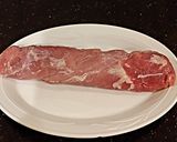 A picture of step 2 of Pork Tenderloin Stuffed with Italian Meats.