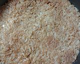 A picture of step 3 of Cheesy, tomato ,and rice with a little meat pie.