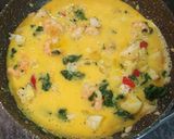 Foto del paso 4 de la receta Revuelto de bacalao con gambas y espinacas