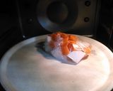 A picture of step 4 of Simmered Daikon Radish, Carrot, Shiitake Mushrooms and Aburaage.
