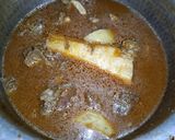 A picture of step 10 of Aloo Gosht.