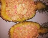 Foto del paso 4 de la receta: Góndola de piña rellena de cóctel de marisco
