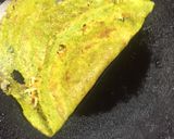 A picture of step 7 of Spinach Cheela wraps.