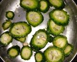 A picture of step 1 of Dry fruits karela.