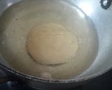 A picture of step 5 of Satpura (Deep fried dessert).