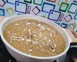 A picture of step 2 of Ashtami Bhog Thali (Halwa, Puri, Kala Chana).