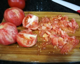 Foto del paso 2 de la receta: Pimientos rellenos con bacalao y arroz sobre salsa de tomate