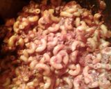 A picture of step 3 of macaroni meatballs and meat and cheese sauce.