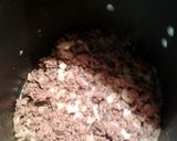 A picture of step 2 of macaroni meatballs and meat and cheese sauce.