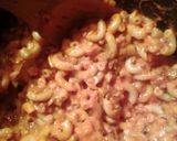 A picture of step 6 of macaroni meatballs and meat and cheese sauce.