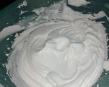 A picture of step 9 of Two tier vanilla and chocolate cake 🎂.
