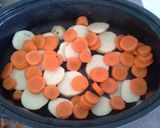 A picture of step 1 of Pork chop dinner in dutch oven.