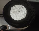 A picture of step 3 of Dosa with aloo masala.