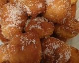 Foto del paso 6 de la receta: Buñuelos rellenos de crema de cacao y coco rallado
