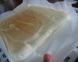 A picture of step 8 of Swiss Roll Cake with Snow-White Swirls.