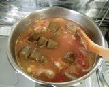 A picture of step 11 of Summer Vegetable Curry with Chicken and Canned Tomatoes.