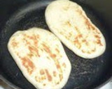 A picture of step 4 of Quick Chewy Basic Naan in a Bread Maker.