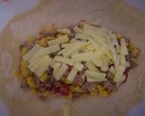 A picture of step 5 of Cheesy Enchiladas.