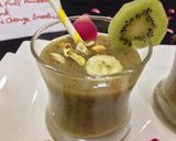 A picture of step 4 of Banana kiwi Smoothie with orange juice.