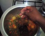 A picture of step 7 of Minji stew served with white rice.