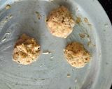 A picture of step 2 of Coconut rounds.