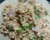 A picture of step 2 of Paneer onion paratha with melting butter.