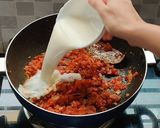 A picture of step 8 of Muttor paneer with laccha paratha.