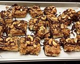 A picture of step 12 of Toasted Coconut Caramel Cashew Bars.
