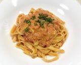 A picture of step 7 of Authentic Crab and Tomato Cream Pasta.