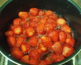 A picture of step 3 of Easy Whole Strawberry Preserves.