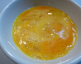 A picture of step 3 of Fluffy Scrambled Eggs with Shiitake Mushrooms.