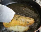 A picture of step 2 of Dried Cheese-Stuffed Chiles Rellenos.