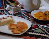 A picture of step 8 of Persian chicken and dried apricot stew.